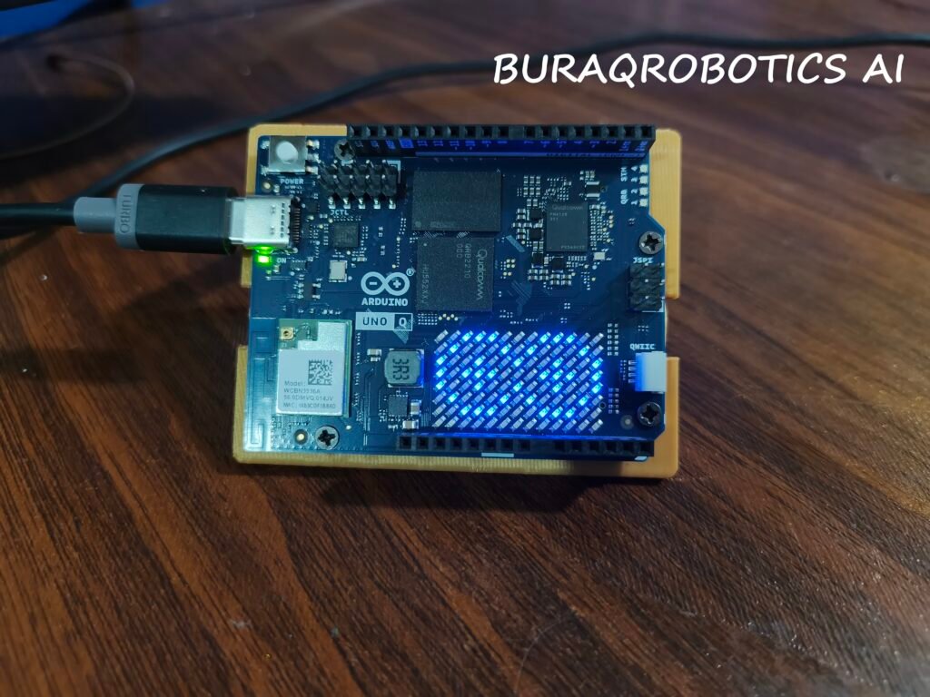 Mohammed founder of Buraq Robotics AI holding Arduino UNO Q board for Arduino Physical AI Challenge India 2026